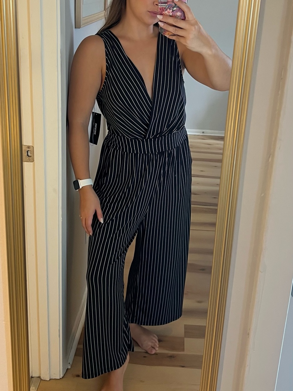 NWT Gilli Black White Pinstripe Wide Leg Jumpsuit Size L Sleeveless Plunge Neck